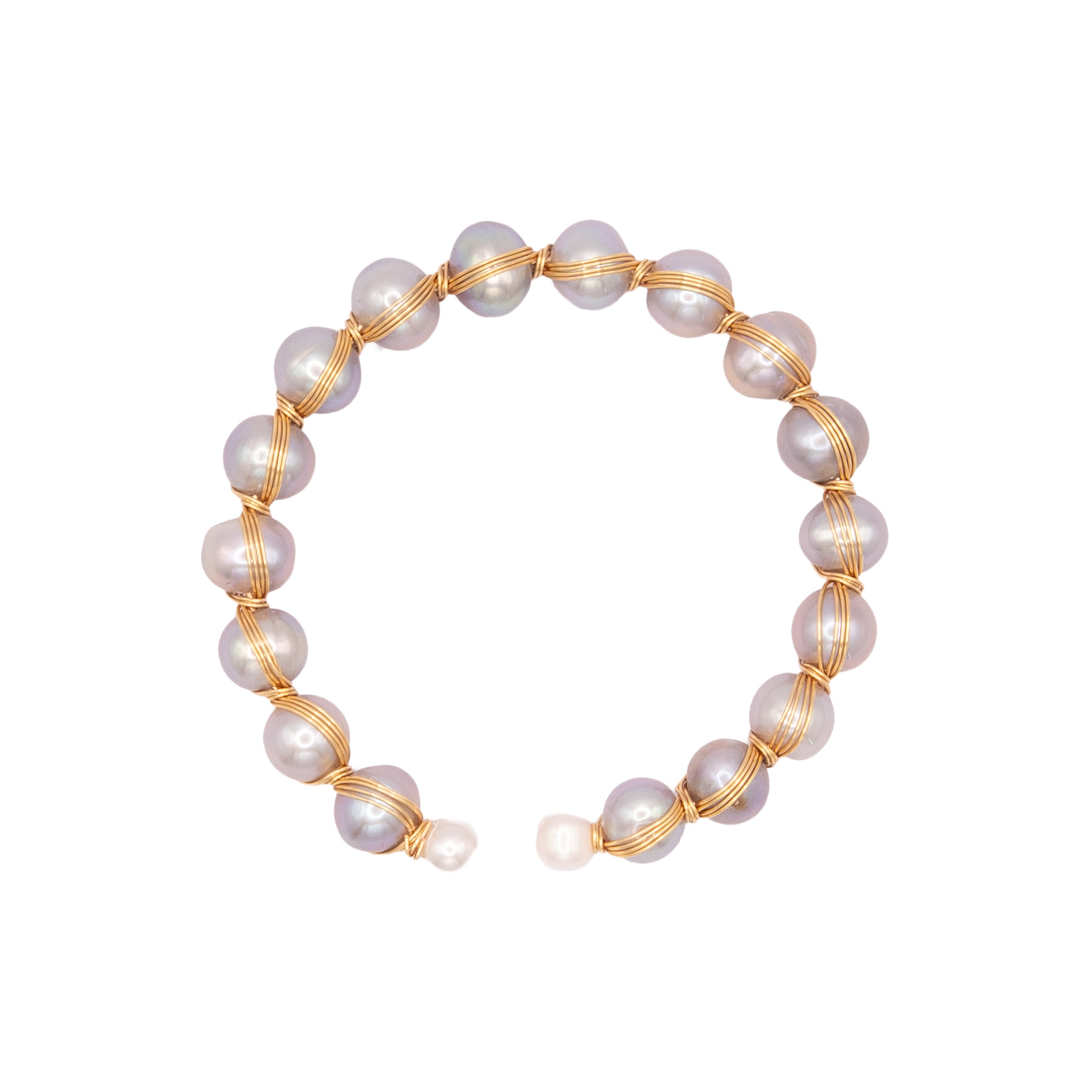 Pearl bracelet with gold wire on a white background